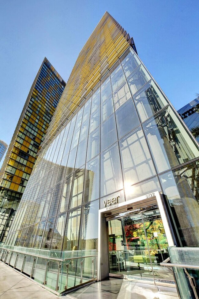 Building Photo - Stunning Strip Views from this Fully Furnished Studio Residence.
