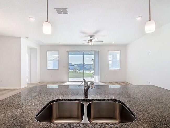 Building Photo - JUST REDUCED! PET FRIENDLY! Experience Com...