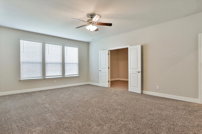 Game room with French doors leading to Media Room - 253 Gill Point Ln