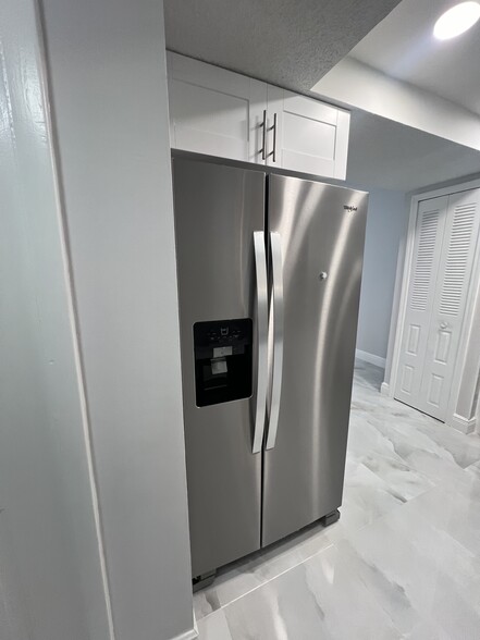 Stainless steel refrigerator with ice maker - 1060 NW 80th Ave