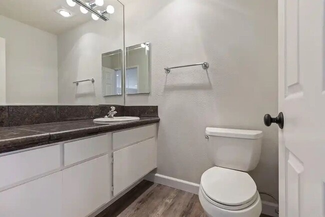 Building Photo - Upgraded La Costa Townhome