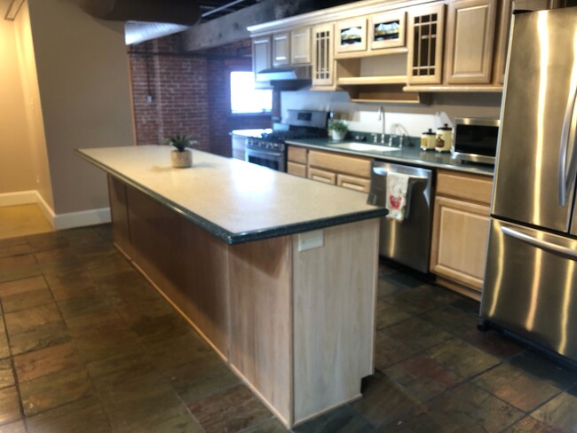 Kitchen with large island - 201 Lamkin St