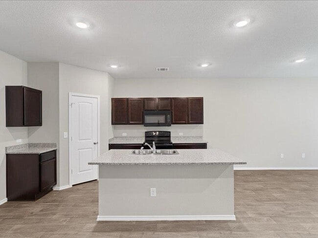 Building Photo - 6305 Wideleaf Dr