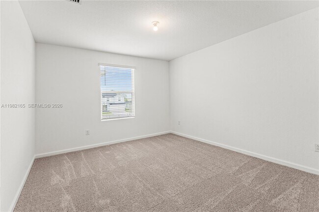 Building Photo - 10722 NW Moon Rise Ln