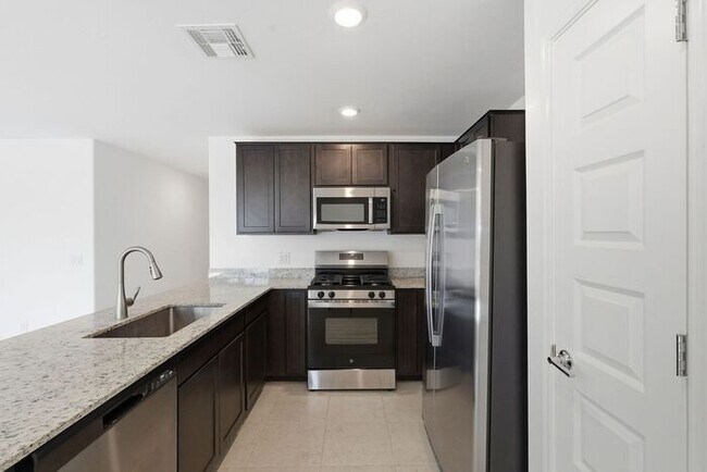 Building Photo - Modern Comfort Meets Desert Serenity – 4 Bed Rocking K Rental Home Available Now!