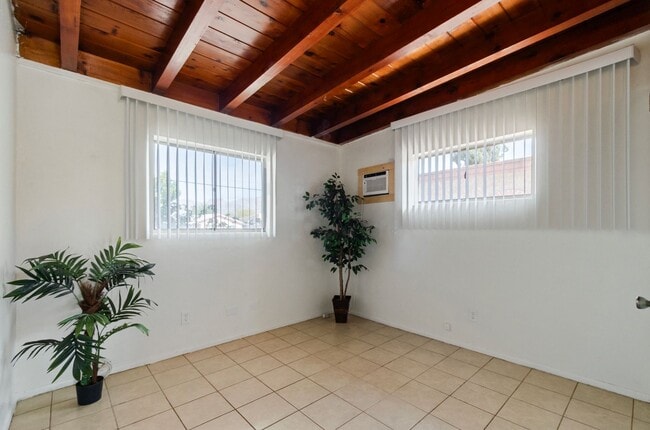 Building Photo - Available March 1, 2026. Updated 2 Bedroom 1.5 Bath Duplex with private dedicated pool.