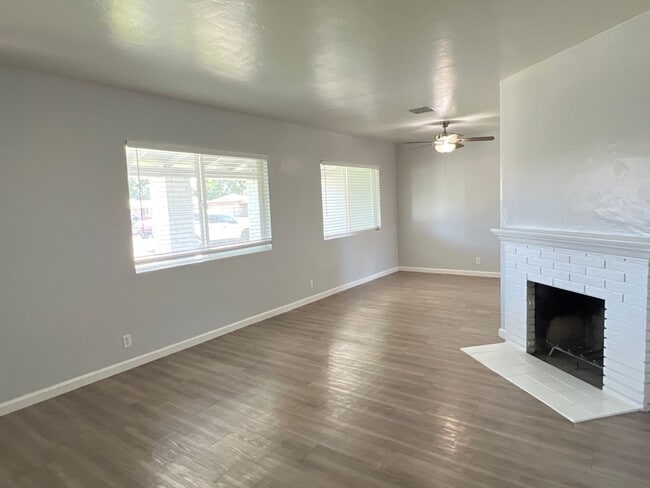 Building Photo - Remodeled 3 Bed Home w/ Fireplace, Garage & Huge Backyard – 93309