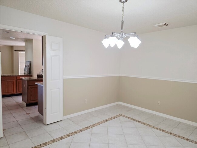 Building Photo - 10306 Jockey Club Dr