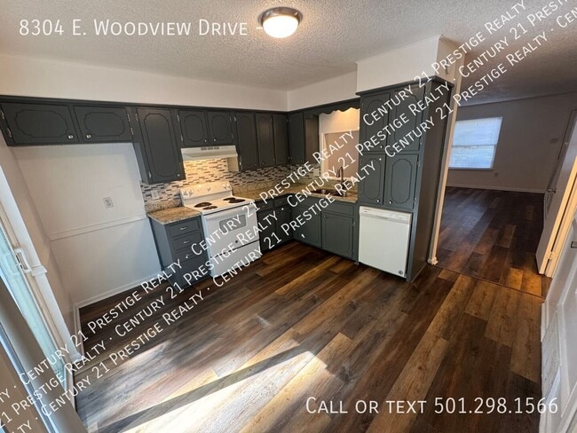 Building Photo - 8304 Woodview Dr N