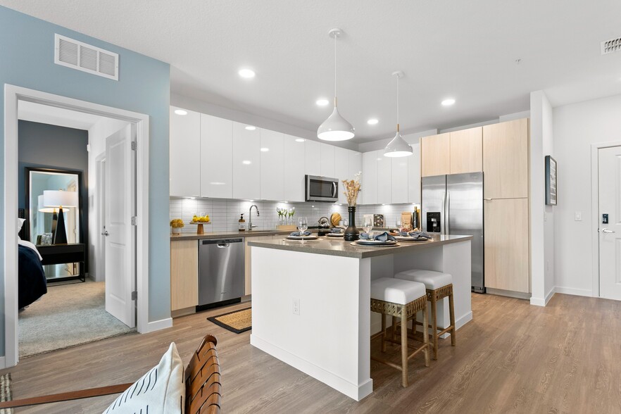 Welcoming Kitchen View with Kitchen Island - Gateway at Pinellas Apartments