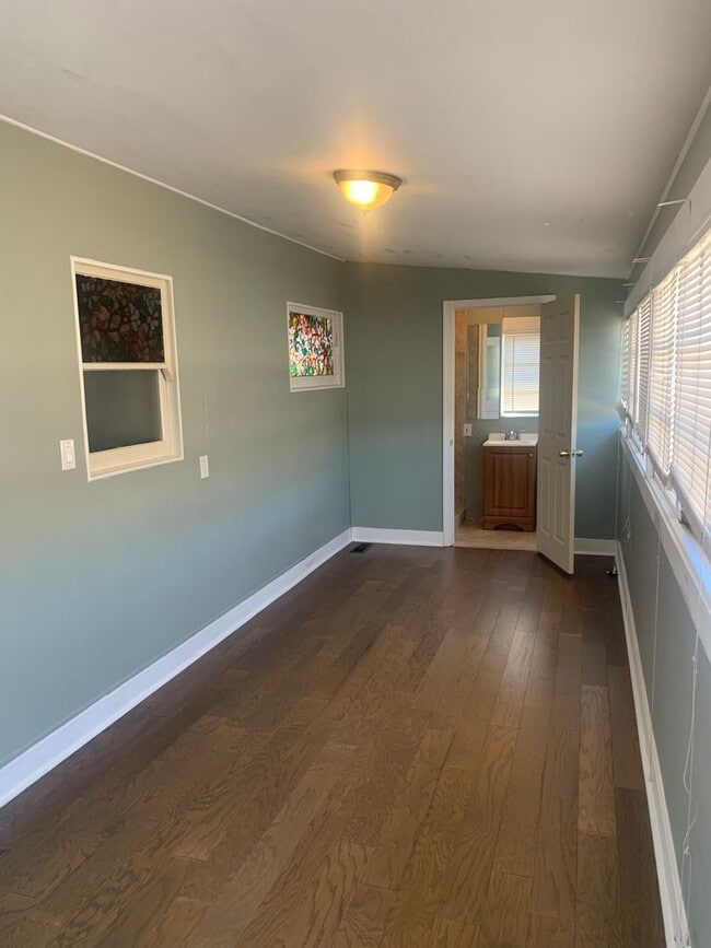 Building Photo - Fully gated Charming craftsman Two bedroom...