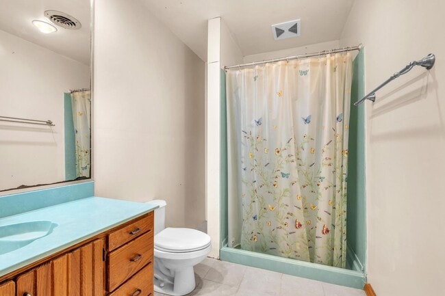Building Photo - Charming home with large garage & attached...