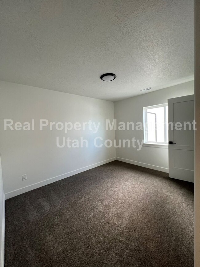 Building Photo - New AF Townhome