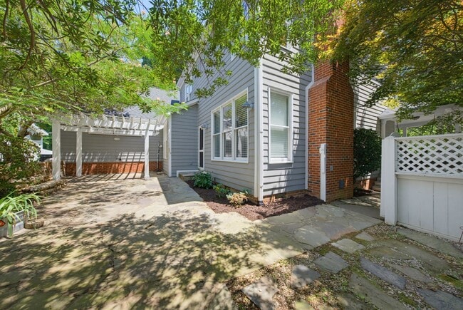 Building Photo - Southern Charm Meets Everyday Entertainment and Convenience!