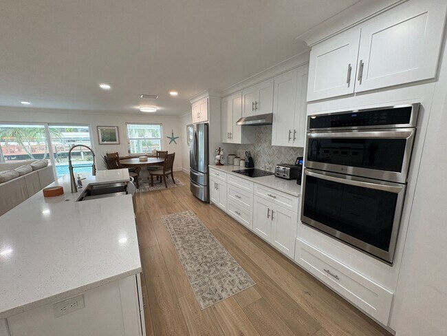 Building Photo - Beautifully Furnished Pool Home with Boat ...