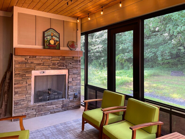 Enclosed Sun Room with fireplace - 547 Sweet Birch Park Ln