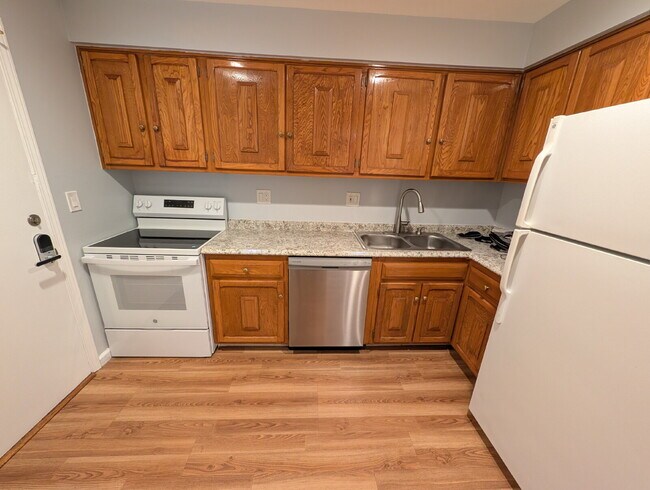 Building Photo - Beautiful 2BR/2BA Condo –  Swimming Pool, Fireplace, In-Unit Laundry, Parking + Storage