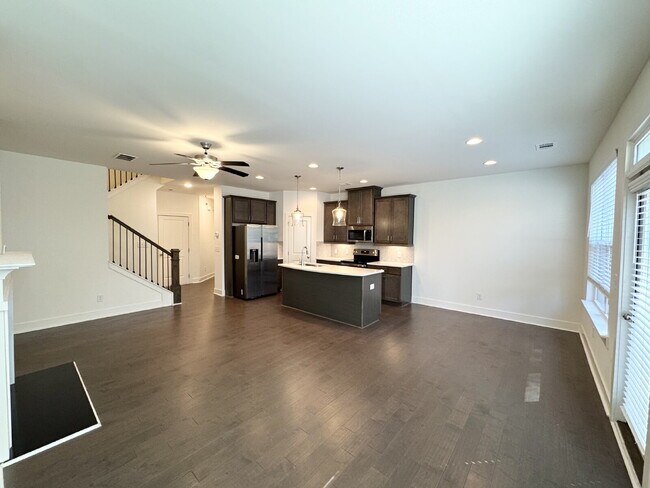 Building Photo - Stylish 3BR Townhome with Private Yard & T...