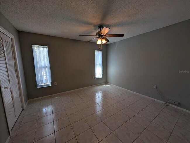 Building Photo - 6947 Bottle Brush Dr