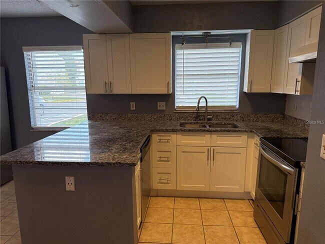 Building Photo - 7210 N Manhattan Ave