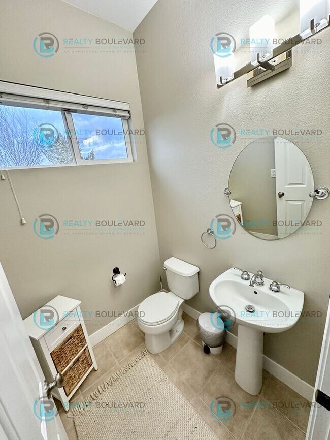 Building Photo - Open Kitchen, Expansive Living, and Covered Patio in Tranquil South Reno Near Trails, Parks & Sho...