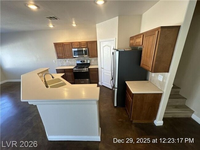Building Photo - Cozy Gated Townhome with Private Yard, 2-Car Garage & Community Pool!