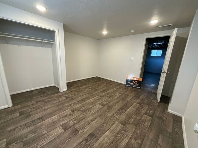 Building Photo - 4 Bedroom 2 Bath Duplex- Carport
