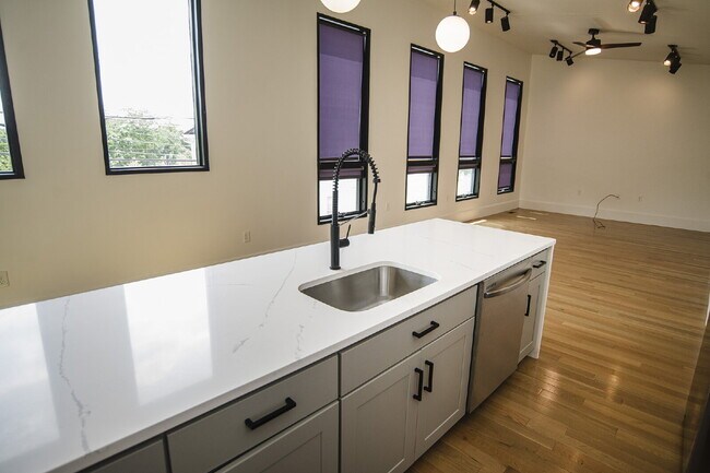 Building Photo - August Only: Submit your application this month and pay a reduced application fee of just $32. Ch...