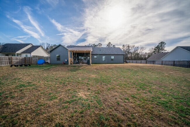 Building Photo - STUNNING modern farmhouse built in 2022 on 1 acre just outside the city limits of Tyler!