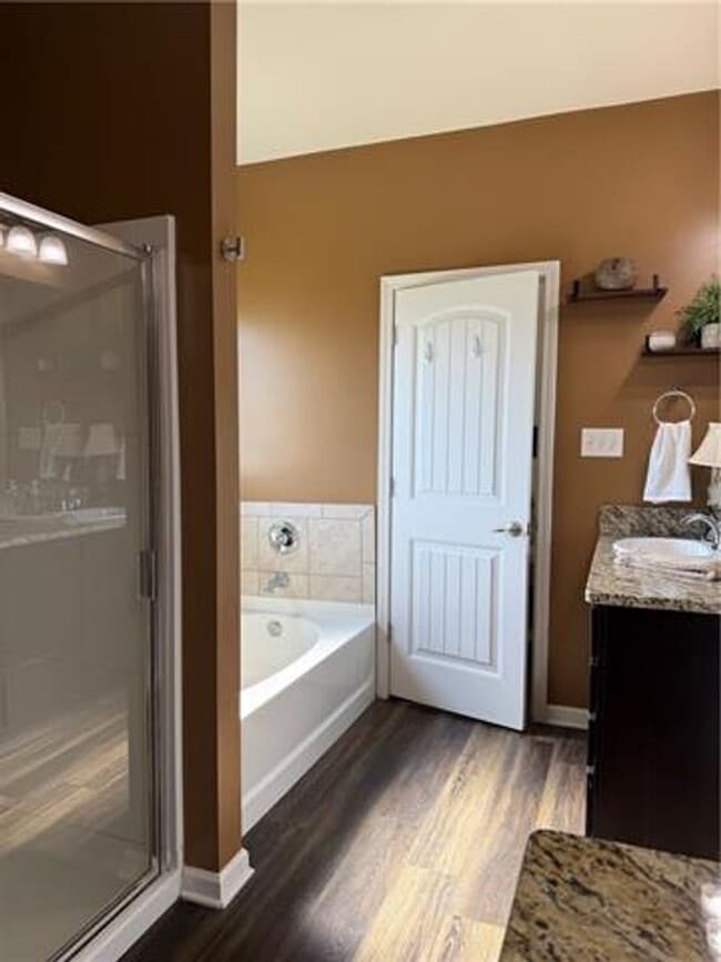 Building Photo - Welcome home to this **beautiful 4-bedroom, 2-bath rental
