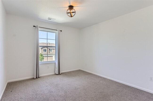 Building Photo - 3-Bedroom Home with Open Floor Plan, Private Balcony & Attached Garage