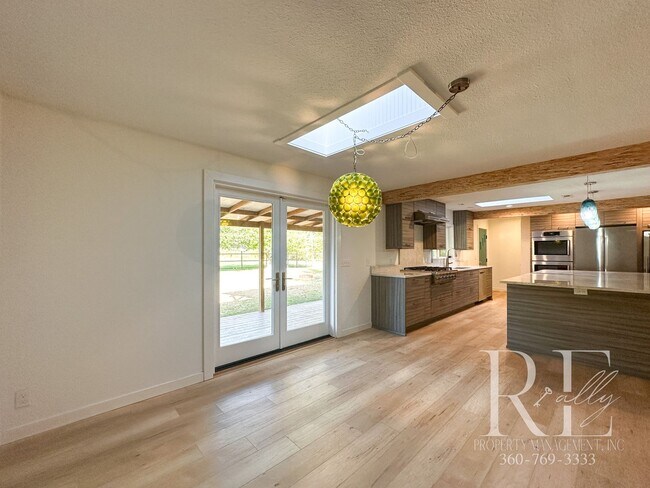 Building Photo - Mid-Century Modern Dream Home with Chef’s ...