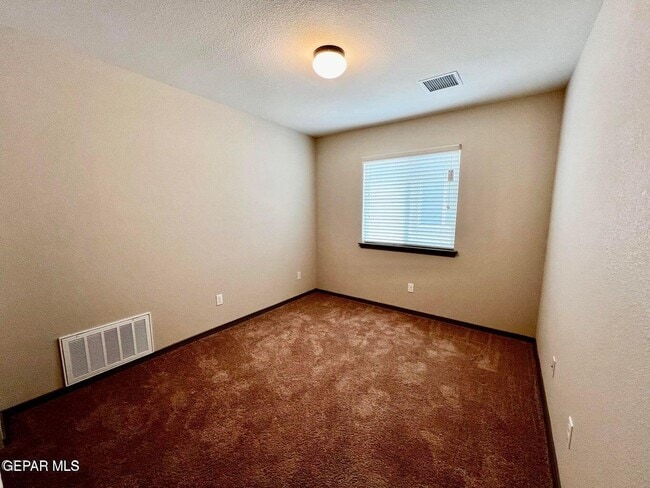 Building Photo - 12777 Tre Maximiliano Ave