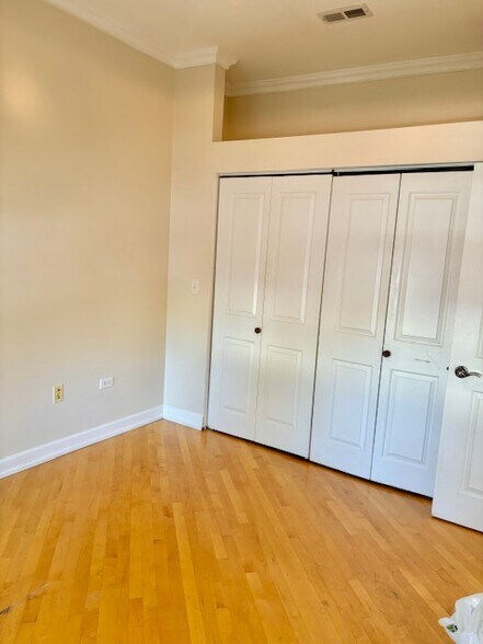 Bedroom + closet - 1618 S Washtenaw Ave