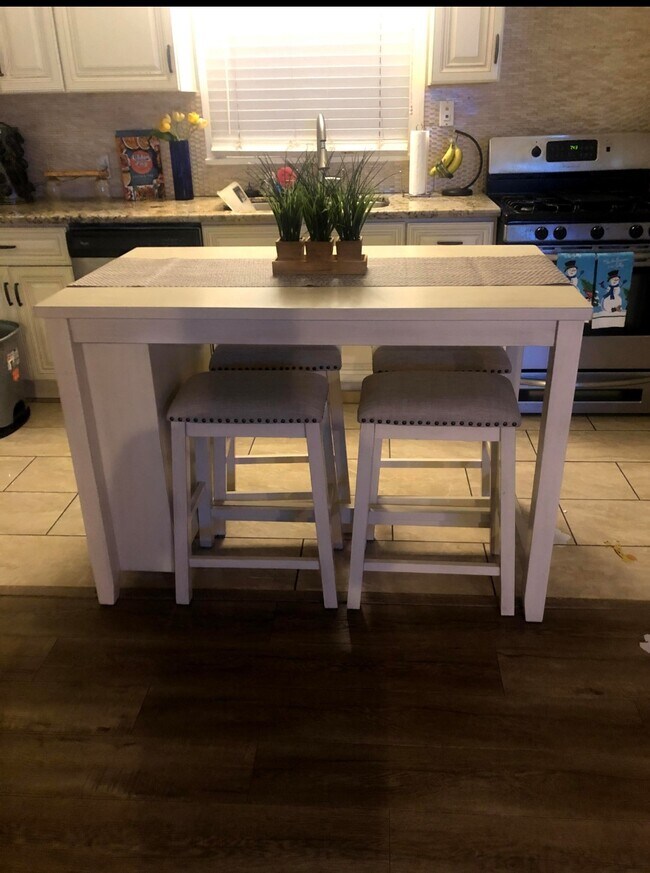 Building Photo - 7823 S Denker Ave