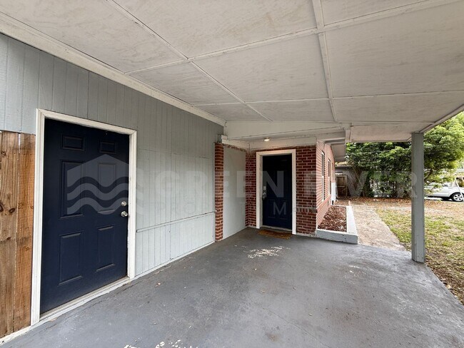 Building Photo - Fully Renovated 2BR Brick Home with Vaulted Ceilings & Backyard Retreat!