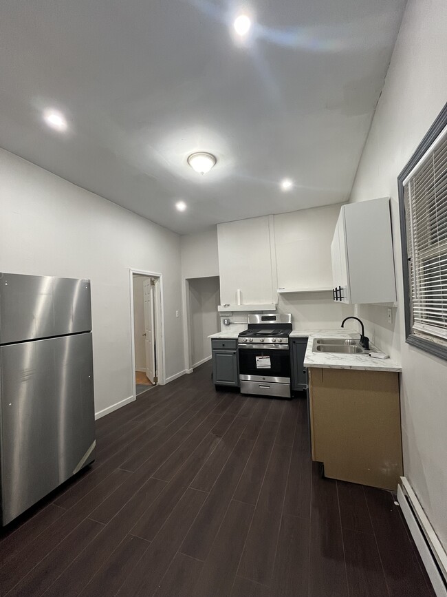 Upgraded kitchen - new appliances and cabinets. New flooring and paintwork - 125 S 9th St