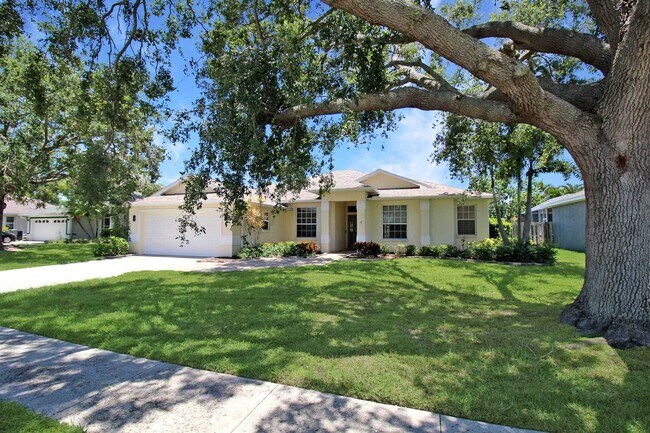 Building Photo - Annual rental: Spacious 3BR/2BA Creekwood Home with Office, Screened Lanai, EV Charger & Resort-S...
