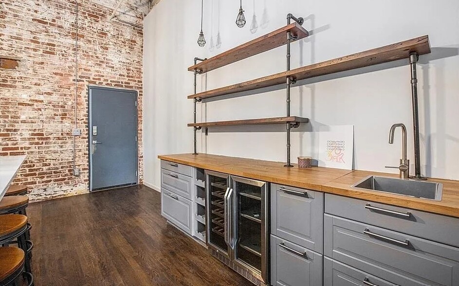 Separate bar with own sink and wine cooler space. - 320 M L K Jr Dr SE