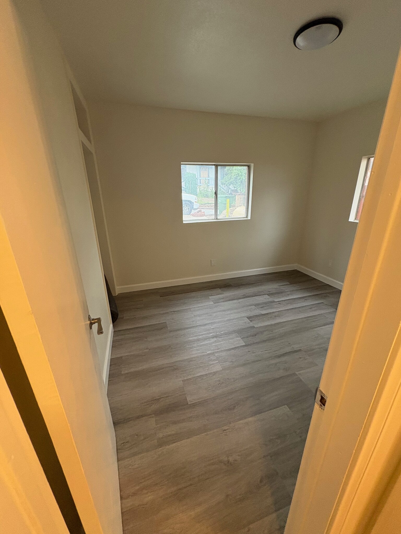 End of the hallway, bedroom on the left. Adjacent to this room in the hallway, a linen closet - 23162 Smith Rd