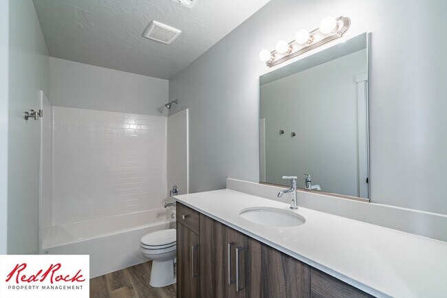 Building Photo - Innovative Design! 4 Bedroom Home in the Beautiful Desert Playa Community