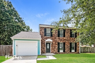 Building Photo - 8405 Old Carriage Ct