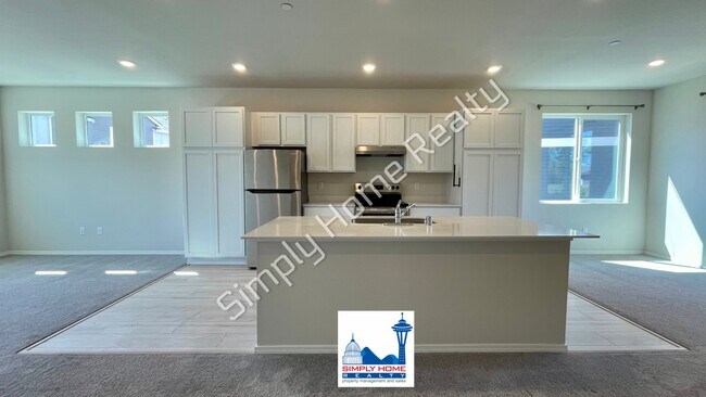 Building Photo - Step Inside to a Townhome Made for Easy Living!