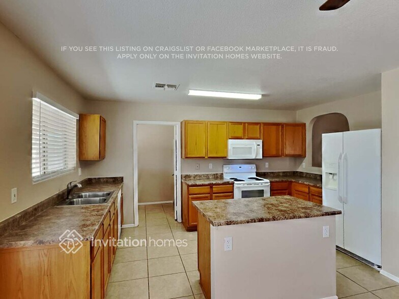 Building Photo - 10749 W Carlota Ln