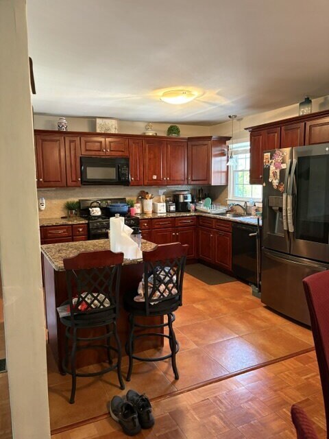 Building Photo - "Charming 4-Bedroom Lancaster Home with Granite Kitchen & Finished Basement Oasis!"