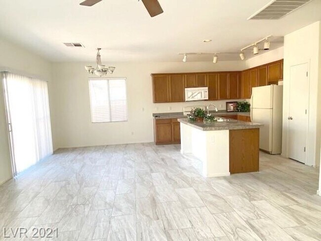 Building Photo - Gated Community! Fabulous 4 Bedrooms Plus Large Loft. One Bed and Bath Downstairs.