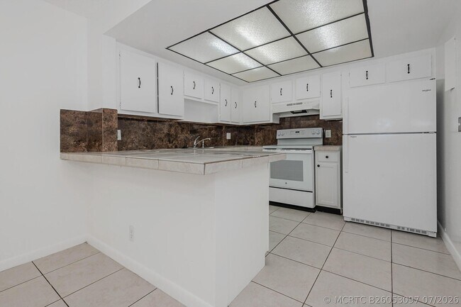 Building Photo - 8830 W Sample Rd