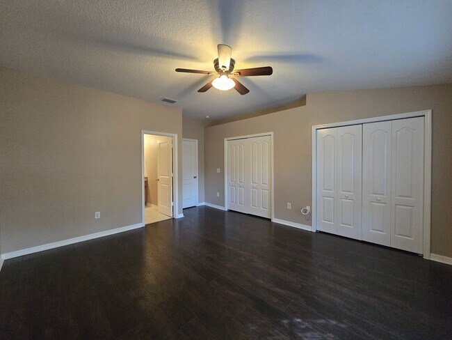 Building Photo - Great Town Home in Gated Community with Pool and Pond View