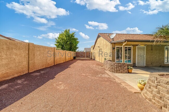 Building Photo - 10415 N 63rd Dr