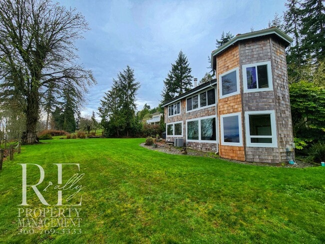 Building Photo - MOVE-IN SPECIAL: 50% OFF FIRST MONTHS RENT - Waterfront Rustic Retreat with Vaulted Ceilings, Pic...